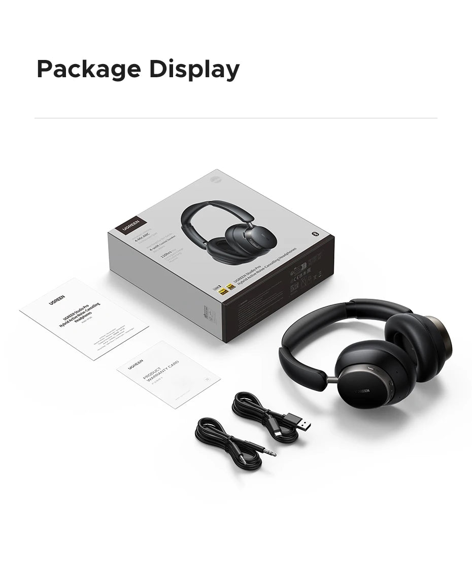 Black headphones with packaging and accessories 