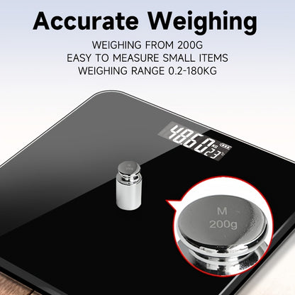 Digital body weight scale placed in home gym setting