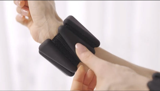 Adjustable 2–4 lb wrist and ankle weights in use for yoga, pilates, running, and water exercises
