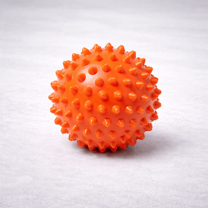 Orange spiked massage ball therapy tool