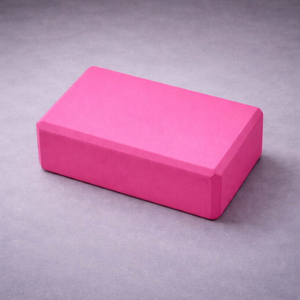 Pink yoga block brick for home yoga and fitness practice
