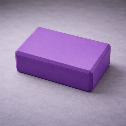 Purple yoga block brick for stretching yoga and pilates
